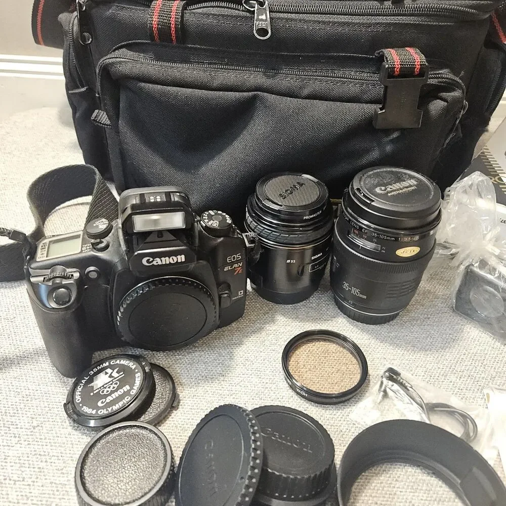 Canon EOS Elan 7E 35mm Film Camera Bundle w/  2 Lenses  Bag Flash Filters More